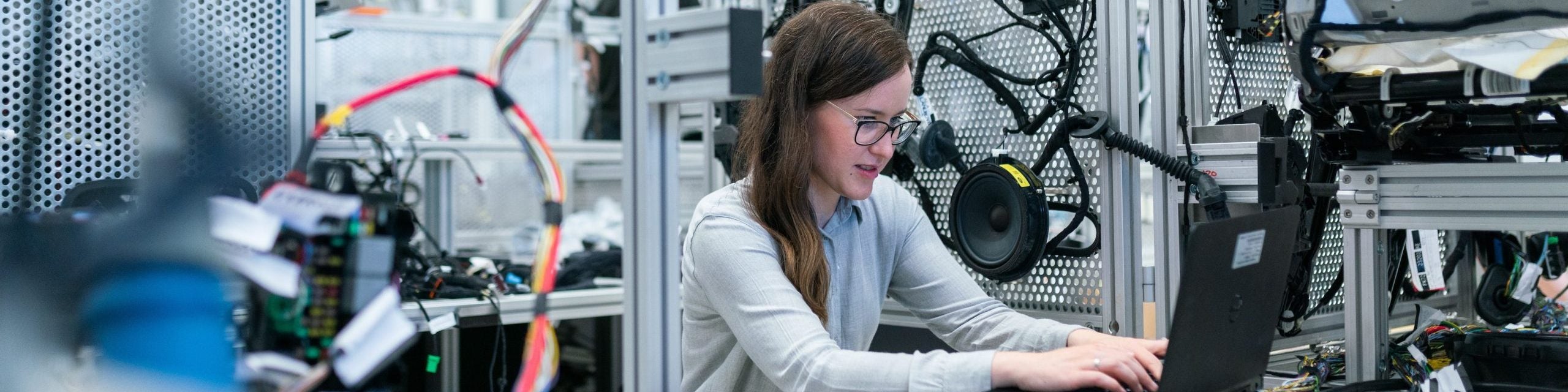 Female engineer works on computer